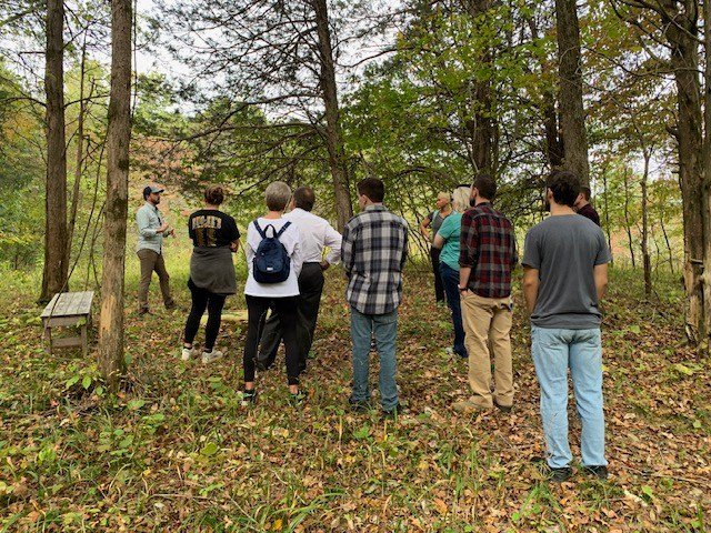  Executive Director, John Christian Phifer, leading a hike and learn experience for the students of John A. Gupton College to learn about natural, green burial at Larkspur. 