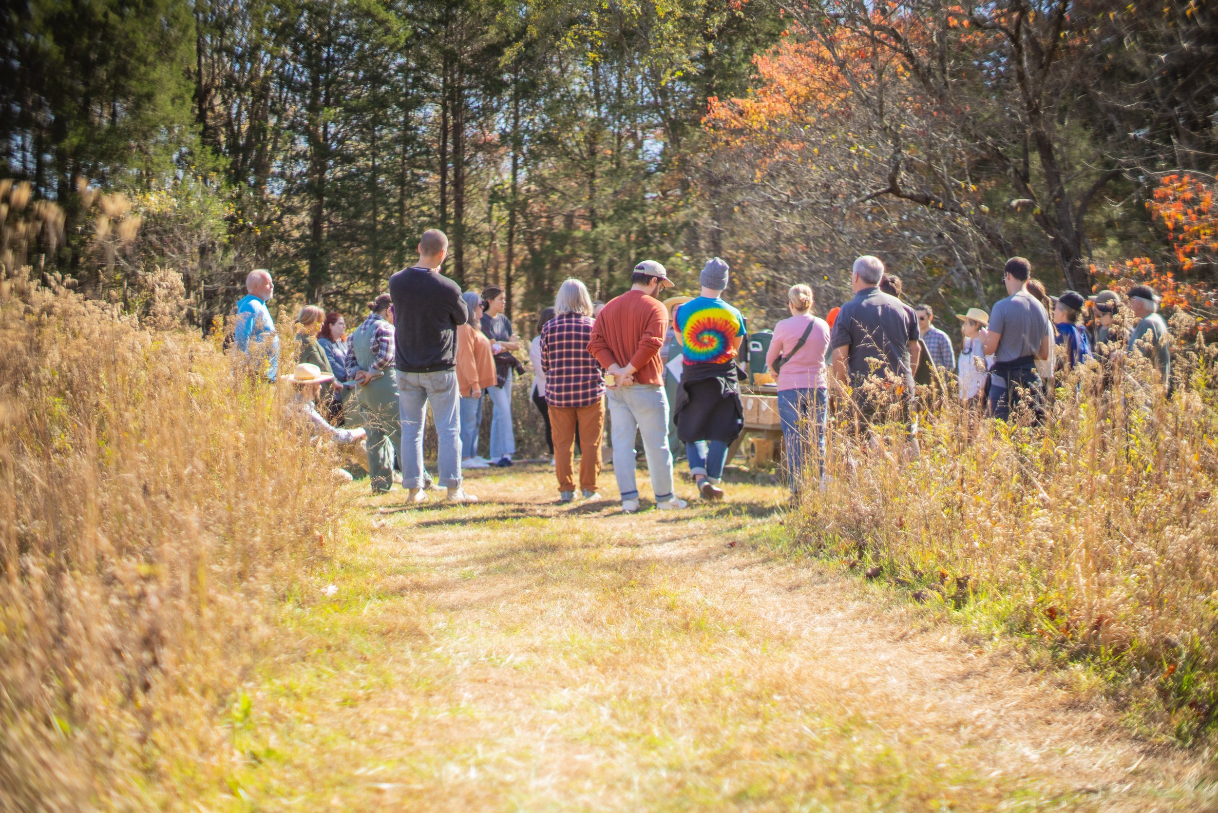  Families and friends of Larkspur gather together during our fall Memorial Planting Day event. 