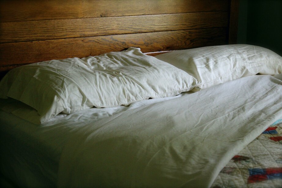  A soft bed with comfortable blankets is a place where a home funeral could occur. 